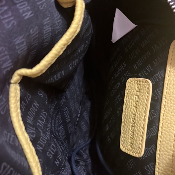 STEVE MADDEN logo mini tassel backpack in pastel yellow - Picture 8 of 11